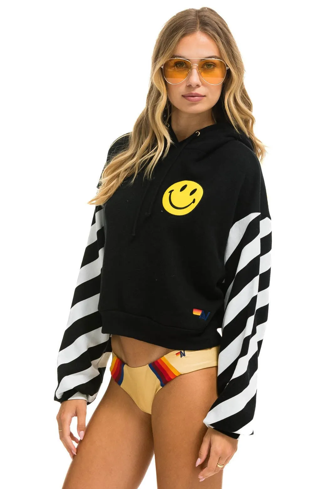 CAUTION STRIPE SLEEVE SMILEY 2 EMBROIDERY RELAXED CROPPED PULLOVER HOODIE - BLACK // WHITE